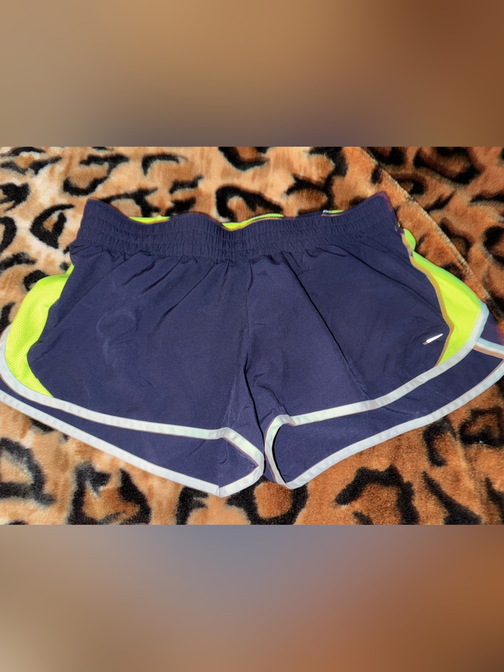 Nike Women's Navy Shorts with Neon Yellow Accents